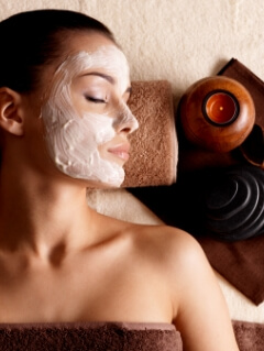 Woman receiving facial at Melt Spa